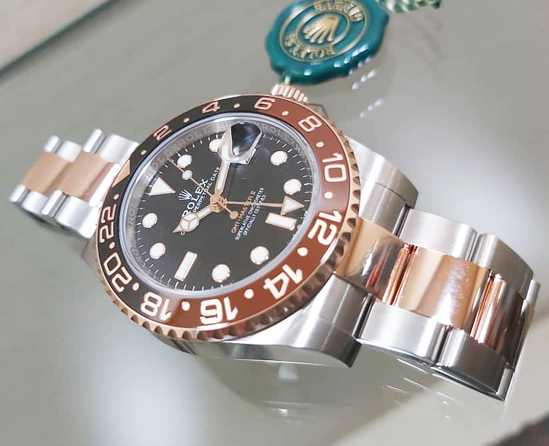 Rolex gmt master 2 half gold sale